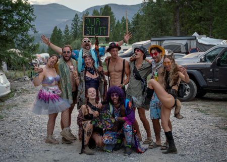 Friends gathered together in the Wicked Woods festival campground.