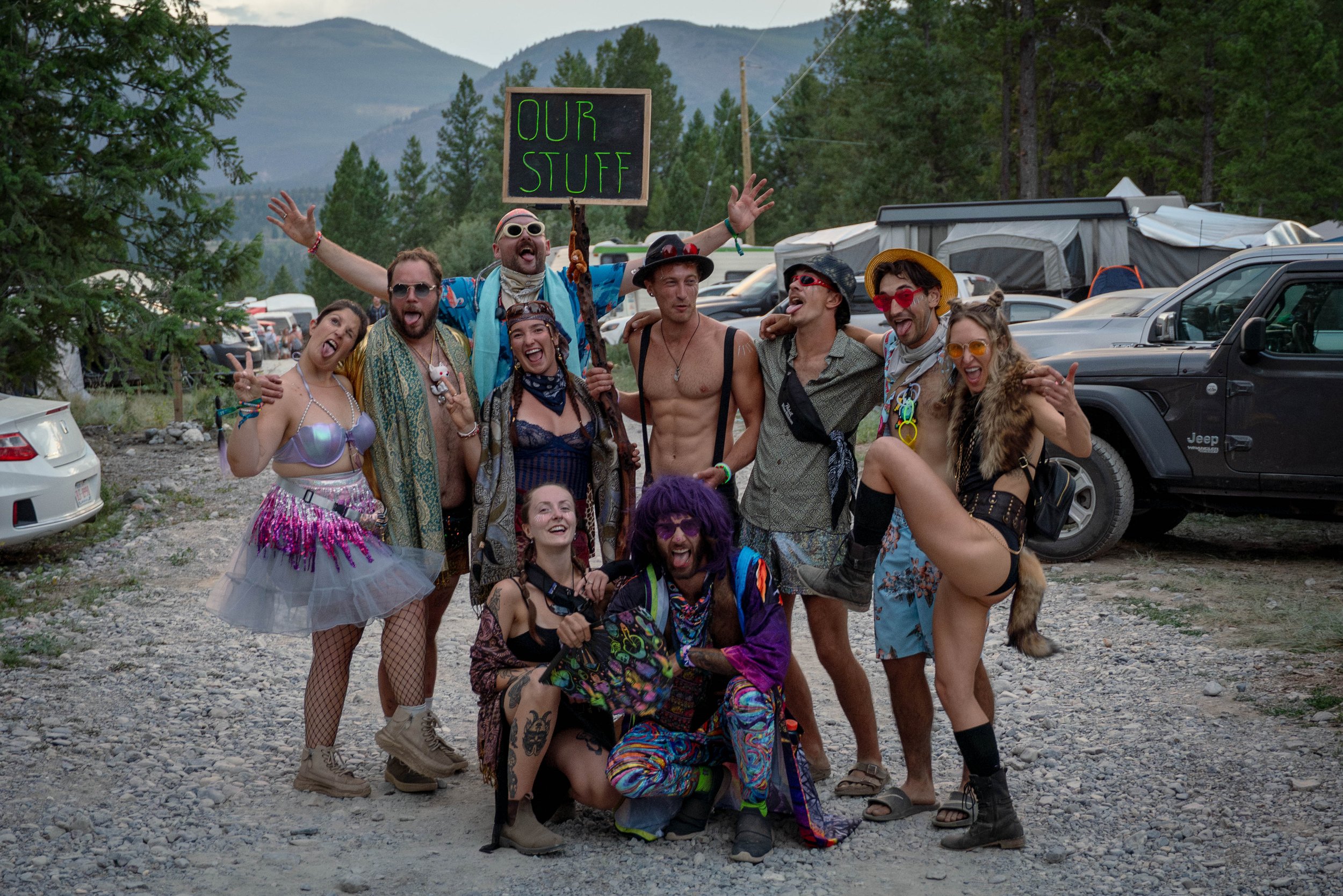 Friends gathered together in the Wicked Woods festival campground.